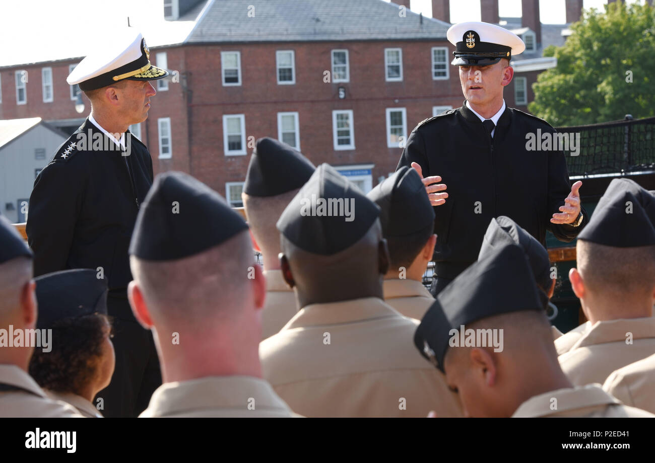 160908-N-OT964-178  BOSTON (Sept. 8, 2016) Master Chief Petty Officer of the Navy (MCPON) Steven Giordano, right, and Chief of Naval Operations (CNO) Adm. John Richardson speak with Sailors during an all hands call as part of their visit to USS Constitution.  The ship, nicknamed 'Old Ironsides', is the oldest commissioned ship in the Navy, and was Giordano's first visit as the 14th MCPON. (U.S. Navy photo by Mass Communication Specialist 1st Class Martin L. Carey/Released) Stock Photo
