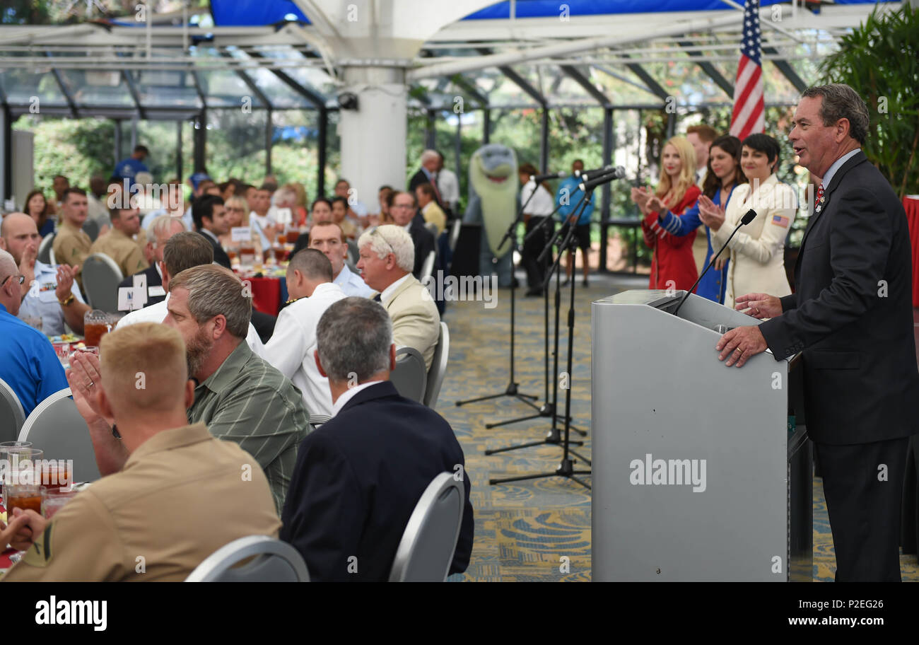 160915-N-KM939-122  SAN DIEGO (Sept. 15, 2016) - Dennis DuBard, 2016 Fleet Week Board President, speaks to a crowd of military members and participants at an Enlisted Recognition Luncheon held at Sea World San Diego, during San Diego Fleet Week 2016. Fleet week offers the public an opportunity to meet Sailors, Marines, and members of the Coast Guard and gain a better understanding of how the sea services support the national defense of the United States and freedom of the seas. (U.S. Navy photo by Mass Communication Specialist 3rd Class David A. Cox/Released) Stock Photo