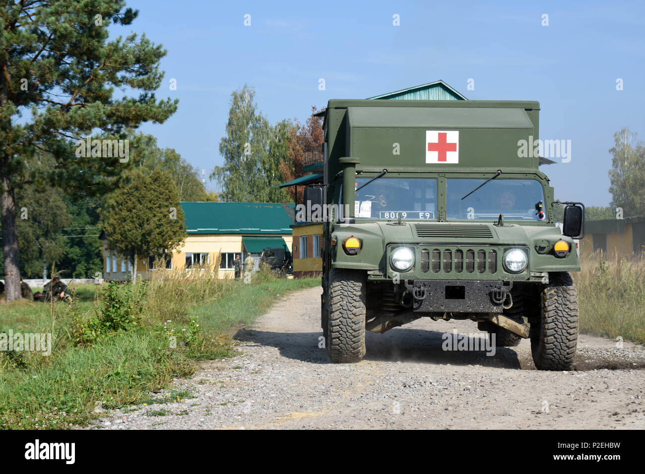 A Ukrainian Soldier drives a new field litter ambulance through the driving range at Yavoriv Training Area, Ukraine on Sep 8, 2016. A team of medics and a mechanic from 557th Medical Company (Area Support) and 212th CSH are working together to conduct field littler ambulance and medical equipment set familiarization with the Ukrainian military from Sep 5 to 16, 2016. (U.S. Army photo by Capt. Jeku Arce, 30th Medical Brigade Public Affairs) Stock Photo