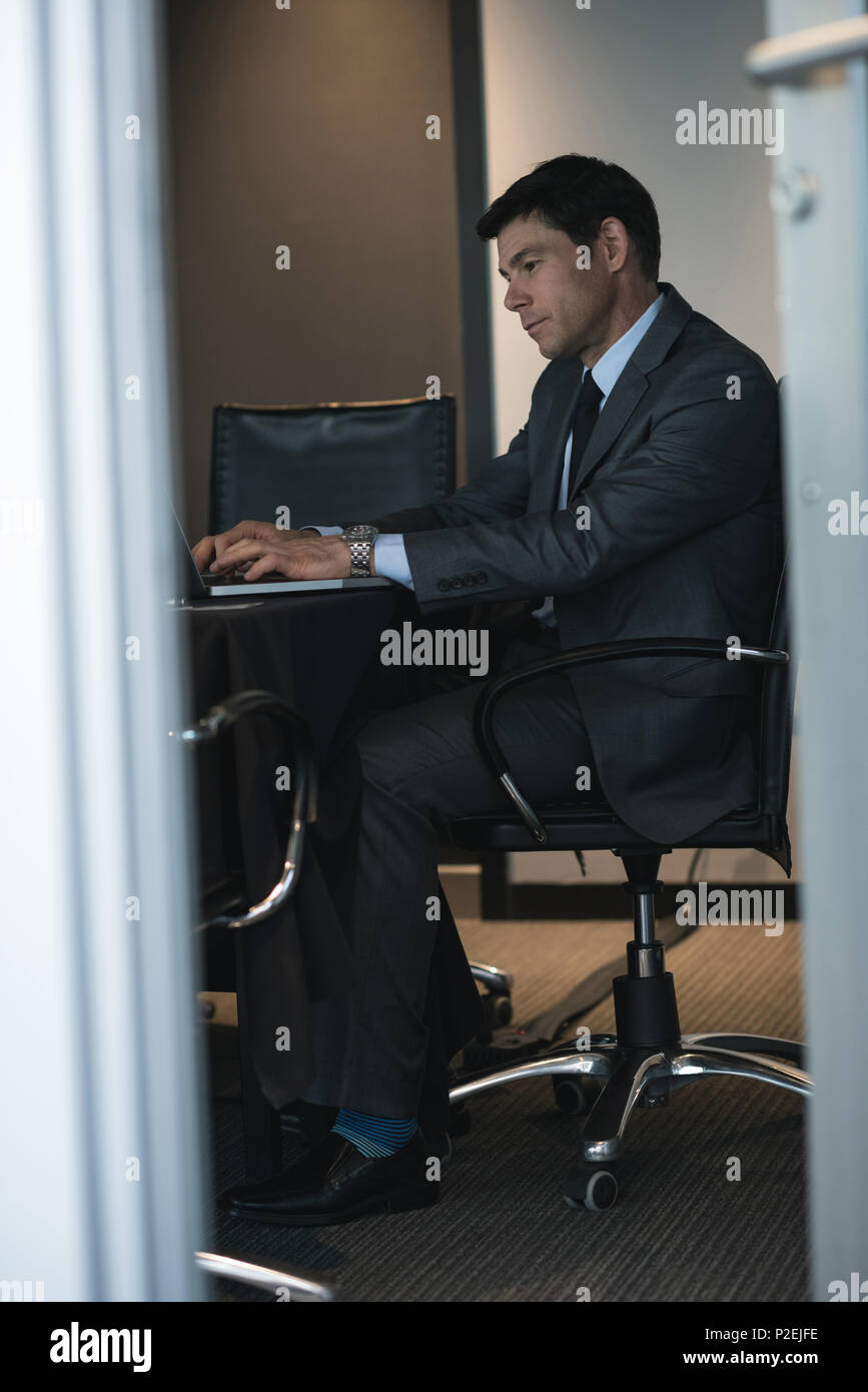 Businessman using laptop Stock Photo