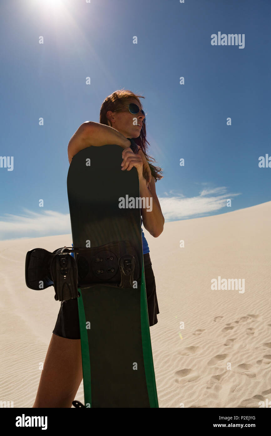 Woman in desert holding hi-res stock photography and images - Alamy