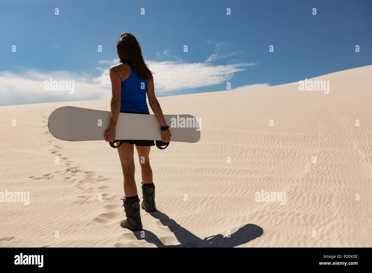 Woman in desert holding hi-res stock photography and images - Alamy