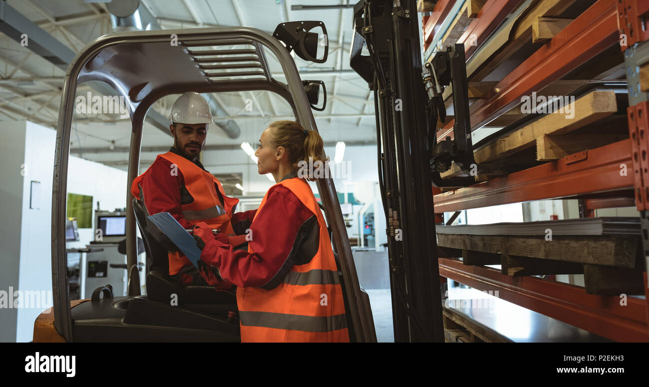 Staffs interacting with each other Stock Photo