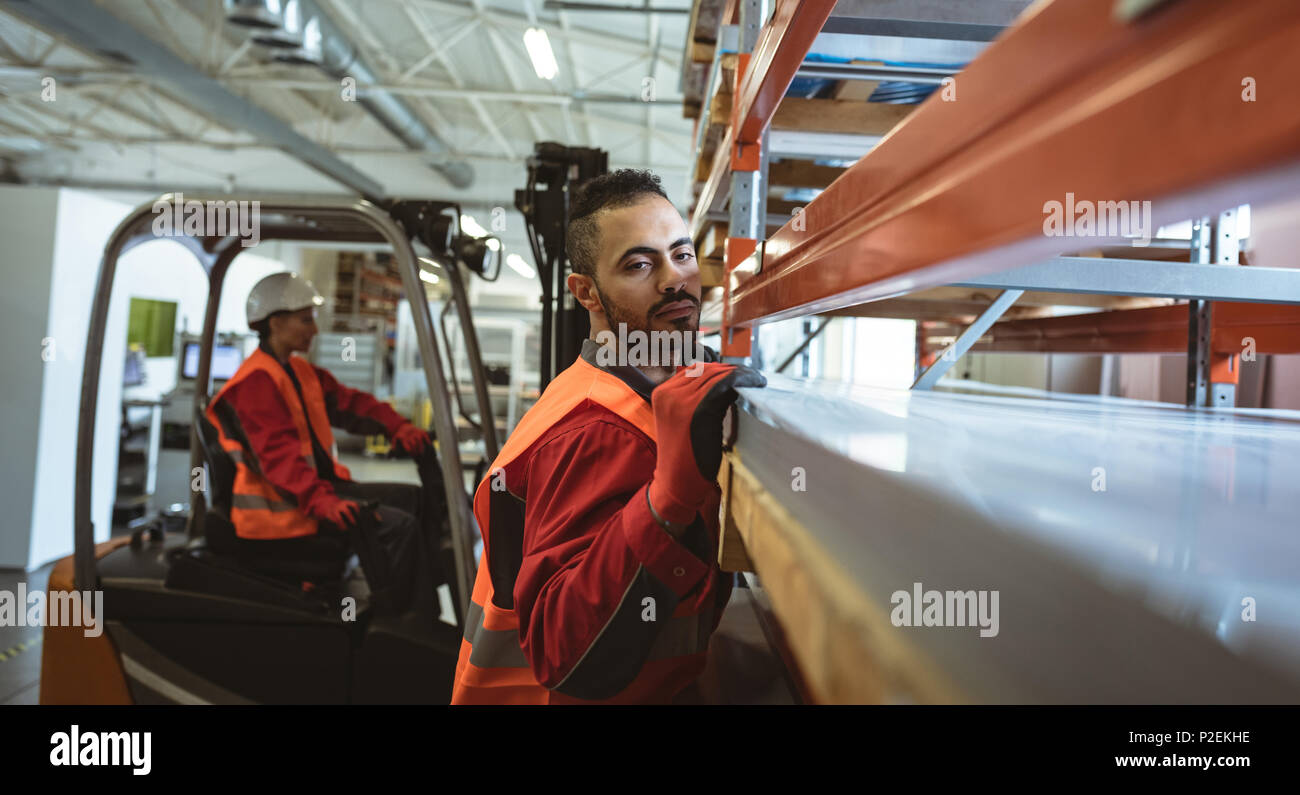Staffs loading goods in the warehouse Stock Photo