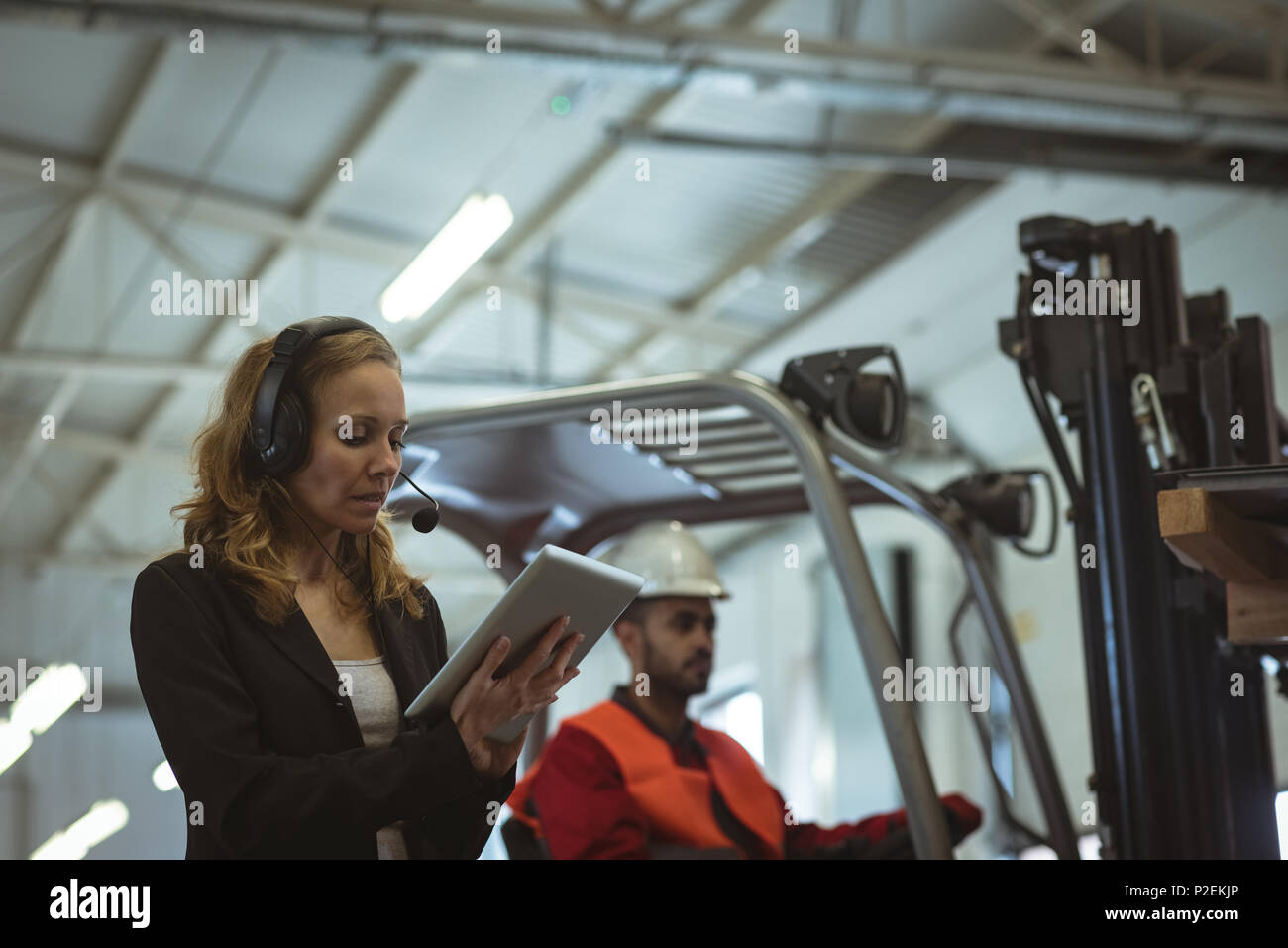Woman using digital tablet Stock Photo
