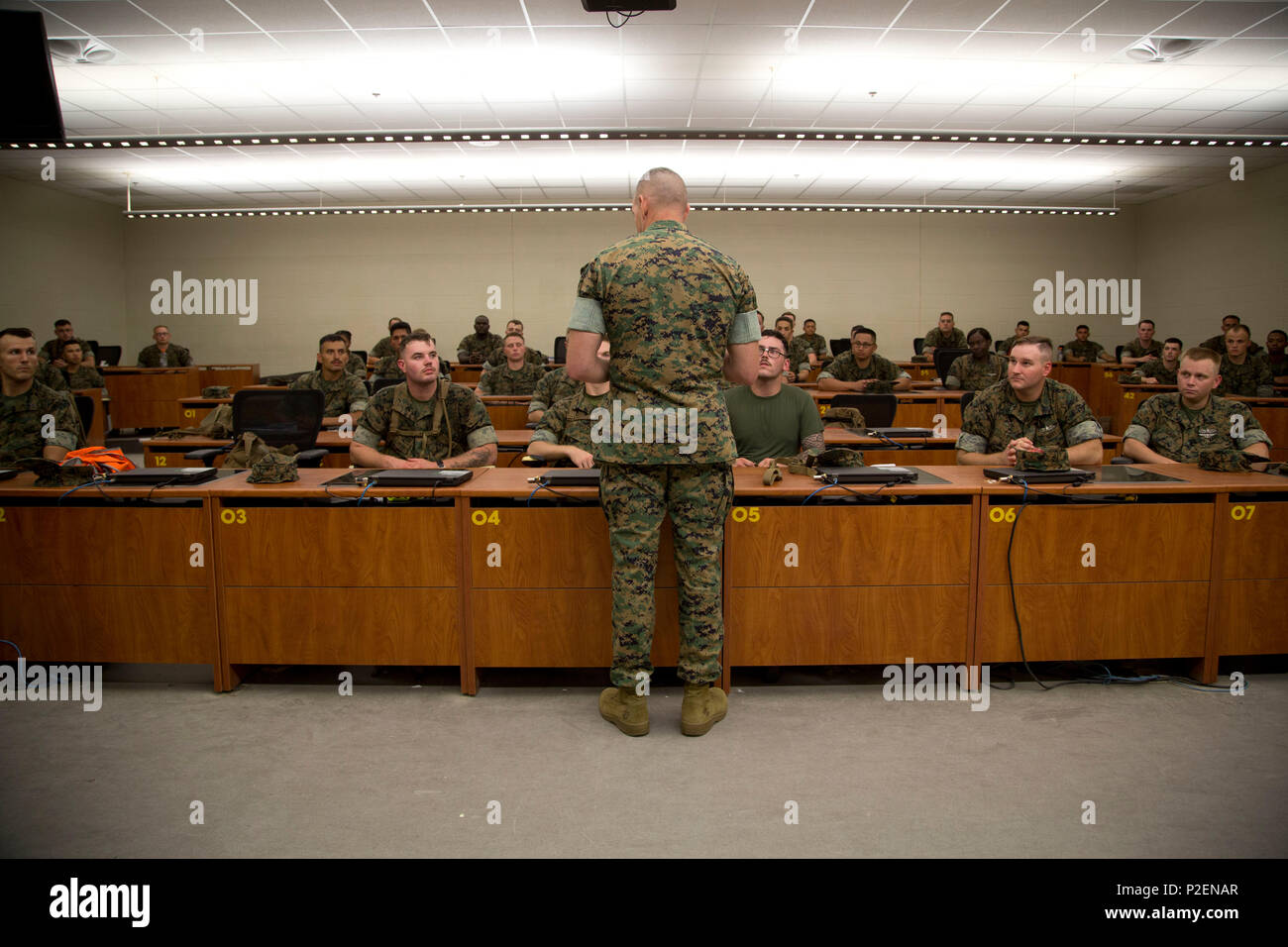 U.S. Marine Brig. Gen. Jason Q. Bohm, Commanding General, Training Command, addresses U.S. Navy Corpsmen with the Field Medical Training Battalion-East, Marine Corps Combat Service Support School (MCCSSS) during a scheduled visit onboard Camp Johnson, N.C., Sept. 8, 2016. Brig. Gen. Bohm visited MCCSSS to receive information concerning current school initiatives, operations and advocacy. (U.S. Marine Corps photo by Cpl. Andrew M. Kuppers) Stock Photo