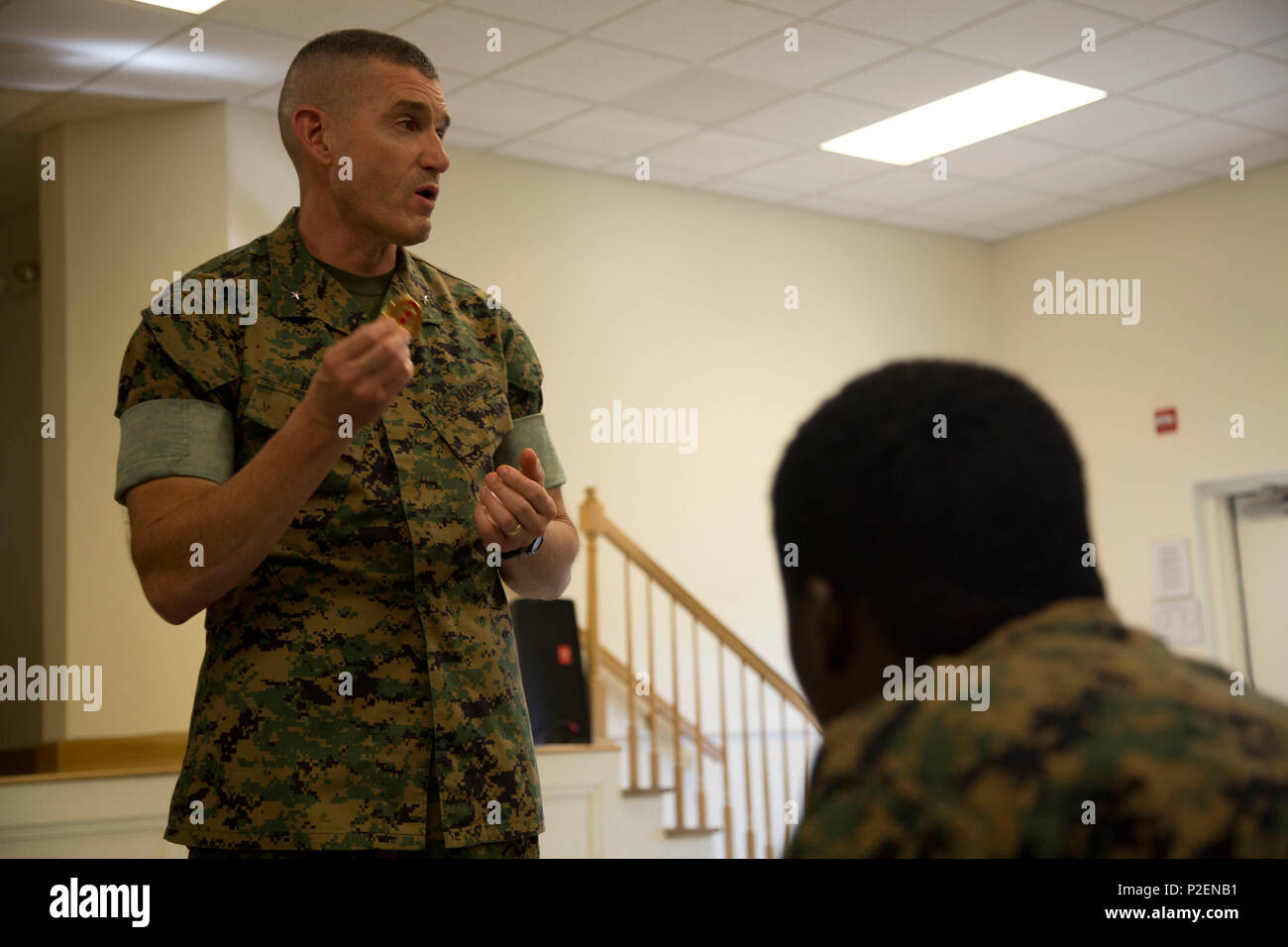 U.S. Marine Brig. Gen. Jason Q. Bohm, Commanding General, Training Command, addresses U.S. Navy Corpsmen with the Field Medical Training Battalion-East, Marine Corps Combat Service Support School (MCCSSS) during a scheduled visit onboard Camp Johnson, N.C., Sept. 8, 2016. Brig. Gen. Bohm visited MCCSSS to receive information concerning current school initiatives, operations and advocacy. (U.S. Marine Corps photo by Cpl. Andrew M. Kuppers) Stock Photo