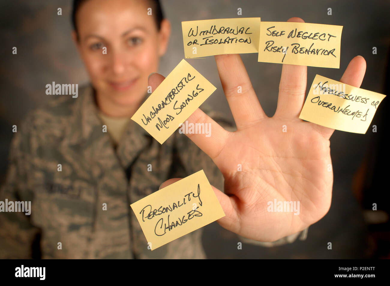 A member of the 111th Attack Wing, Horsham Air Guard Station, Pa., display the five signs that may mean someone is in emotional pain and might need help, Sept. 8, 2016. Guardsmen play a key role in spotting fellow service members at risk for suicide. (U.S. Air Force photo by Master Sgt. Chris Botzum) Stock Photo