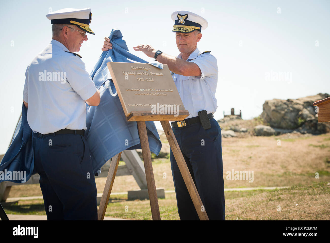 Rear Adm. Steven Poulin, the First Coast Guard commander, and Adm. Paul