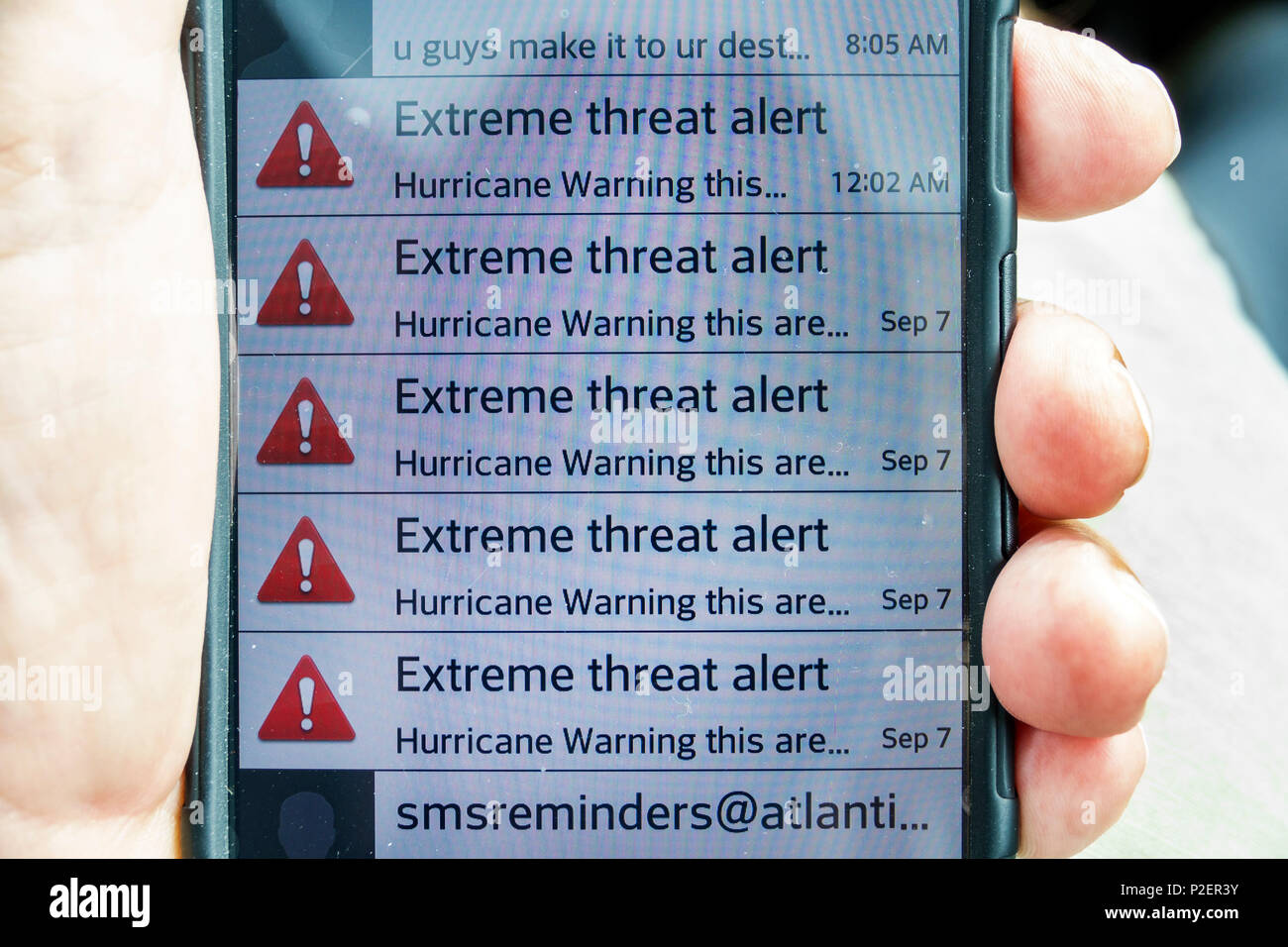 Florida Arcadia,smartphone cell phone phones cell phone,extreme threat alert hurricane warning Irma,FL170911039 Stock Photo