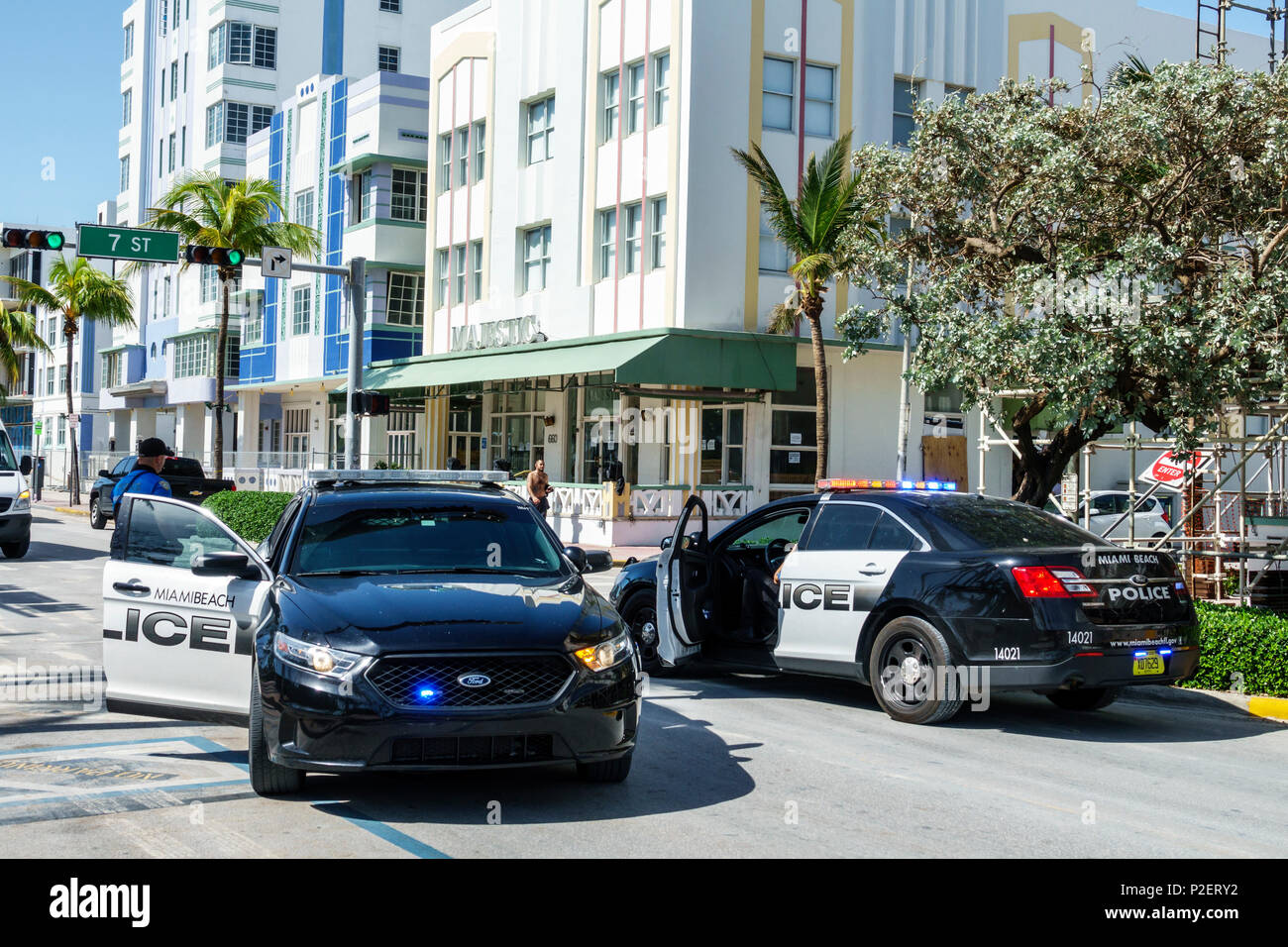 Miami Beach Florida,Ocean Drive,police cars,blocking traffic,man men male,police officer,public safety,FL170911078 Stock Photo