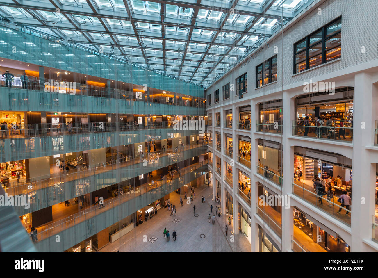 Shops and atrium inside JP Tower, Chuo-ku, Tokyo, Japan Stock Photo