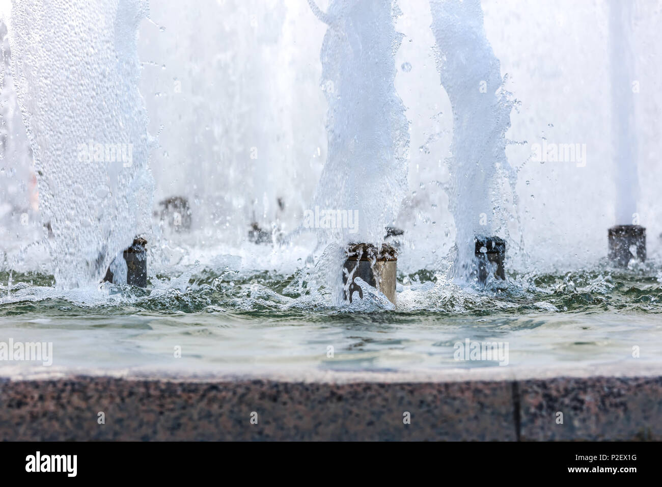 splashes of fountain water with bubbles on surface. detail closeup Stock Photo