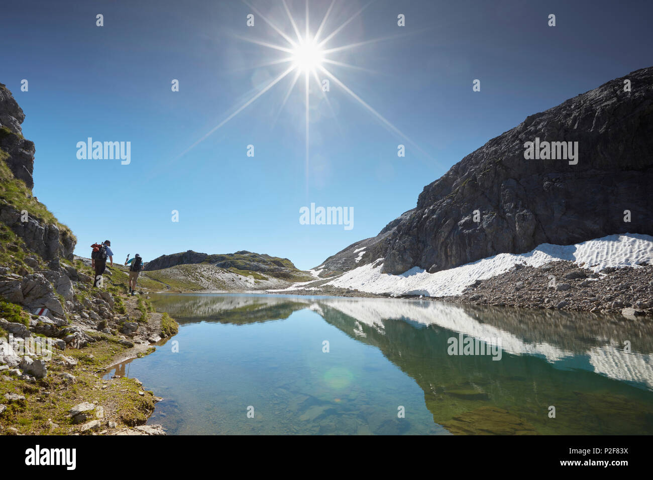 Hiker, Fourclada Rims 2940m, Sesvenna range between Unterengadin Switzerland and Vinschgau, Italy Stock Photo