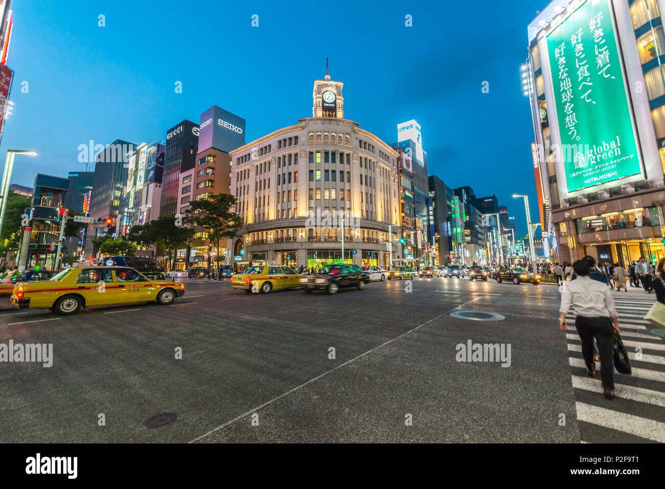 Crossing with taxis at Wako Building in Ginza, Chuo-ku, Tokyo, Japan Stock Photo