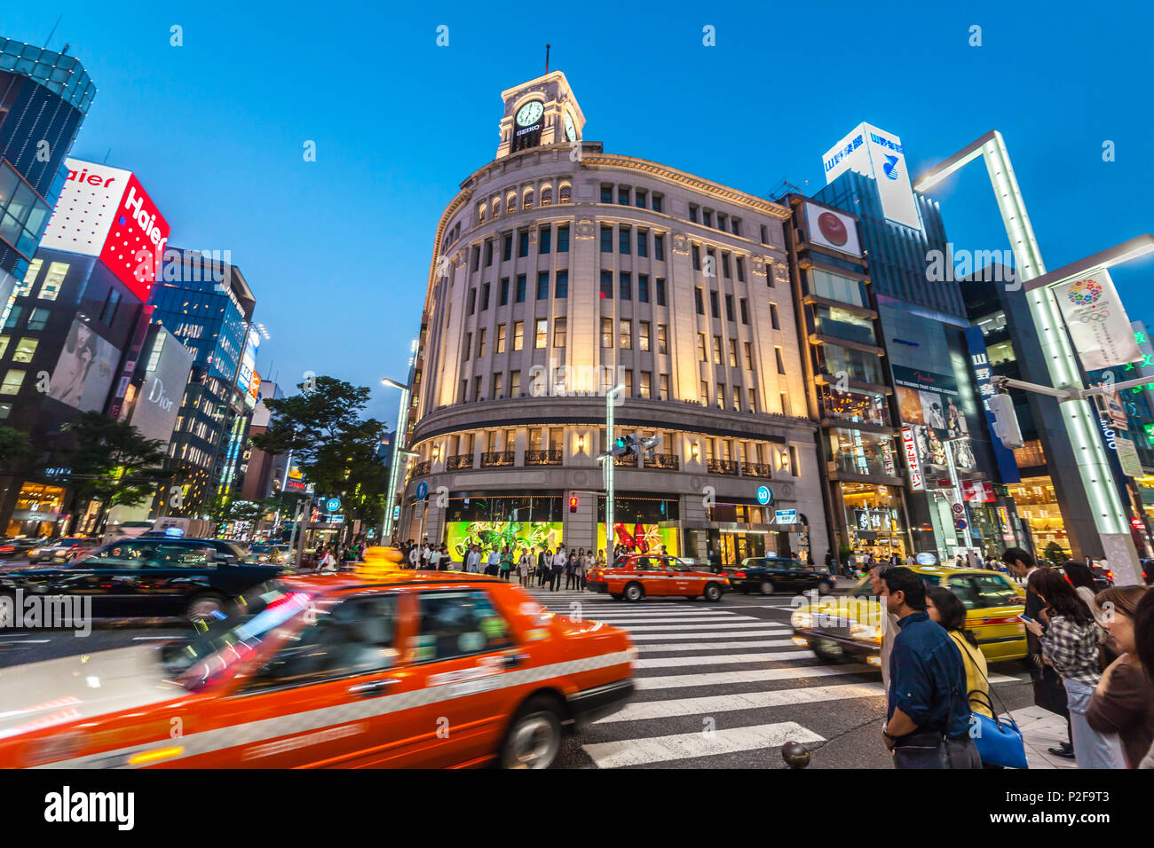 Crossing with taxis at Wako Building in Ginza, Chuo-ku, Tokyo, Japan Stock Photo