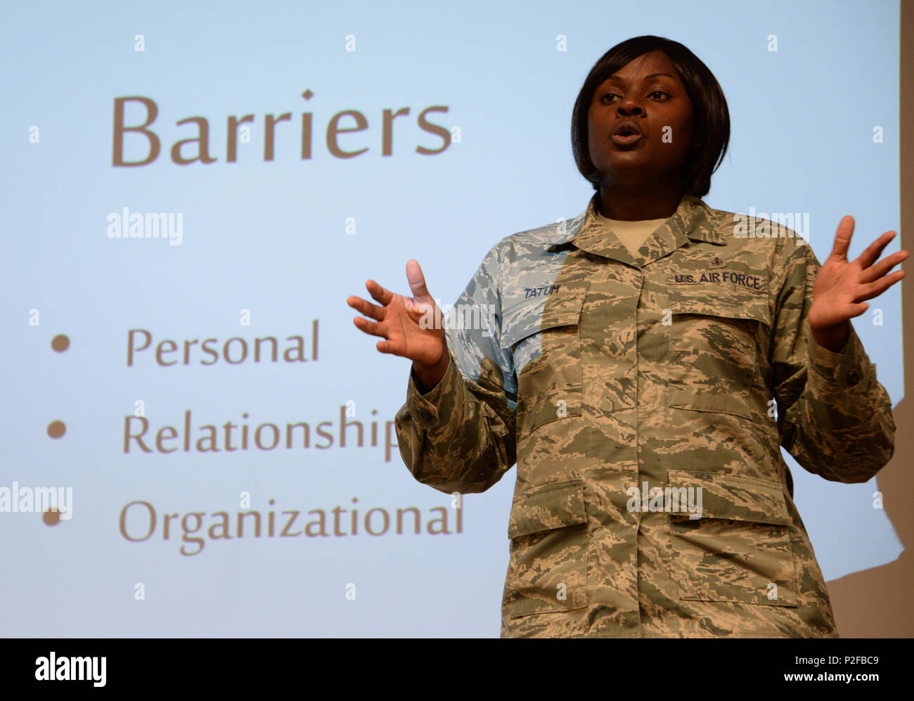 Tech. Sgt. Quintina Tatum, 60th Dental Squadron dental technician from Dallas, Texas, explains