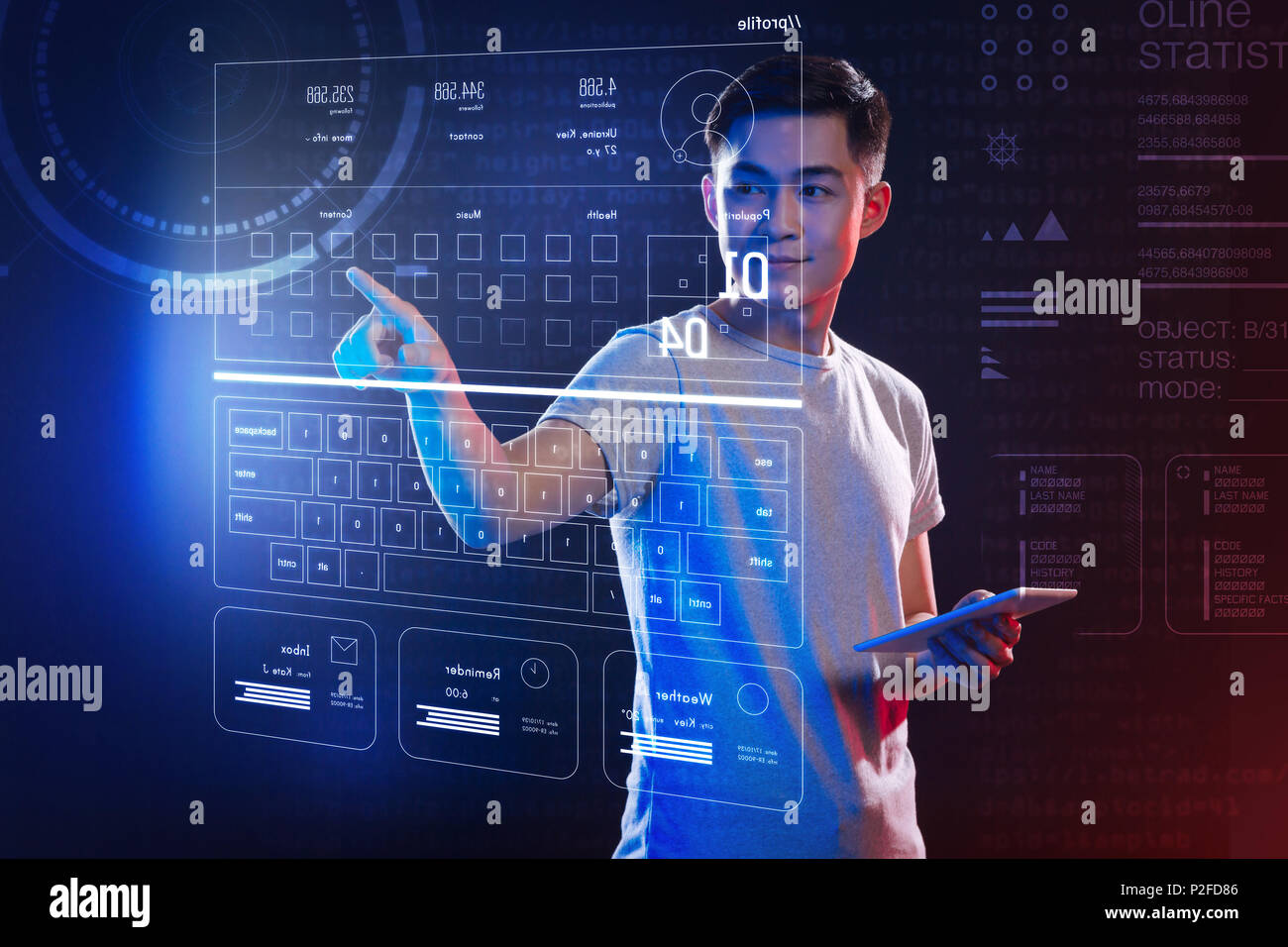 Smiling IT manager feeling confident while using the hologram Stock Photo