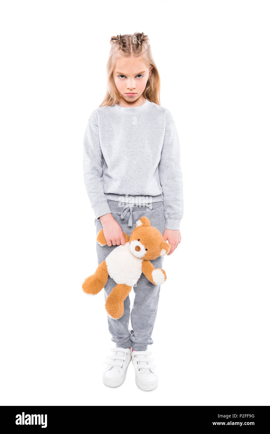 little girl holding a teddy bear