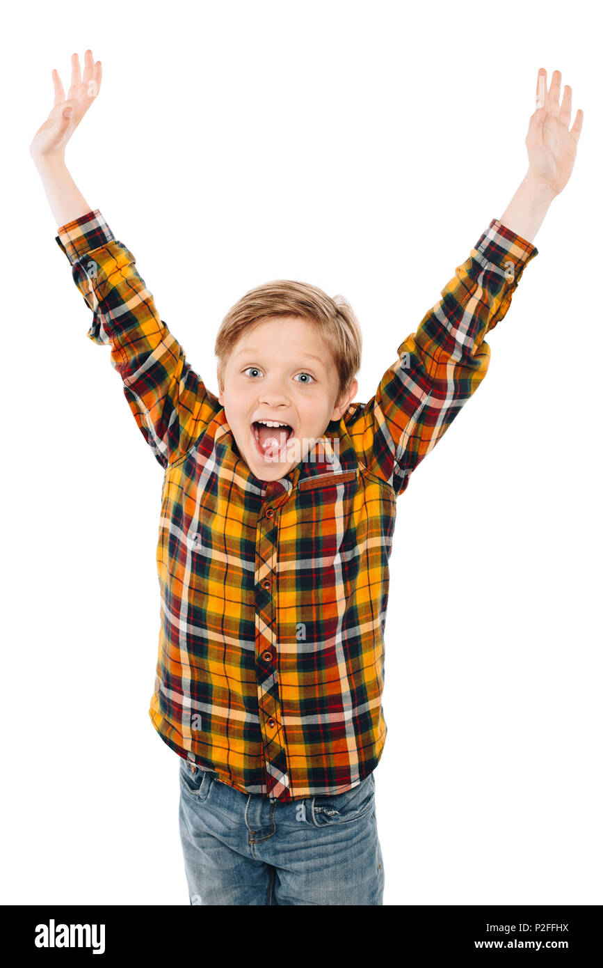 excited little boy raising hands and smiling at camera isolated on white  Stock Photo - Alamy