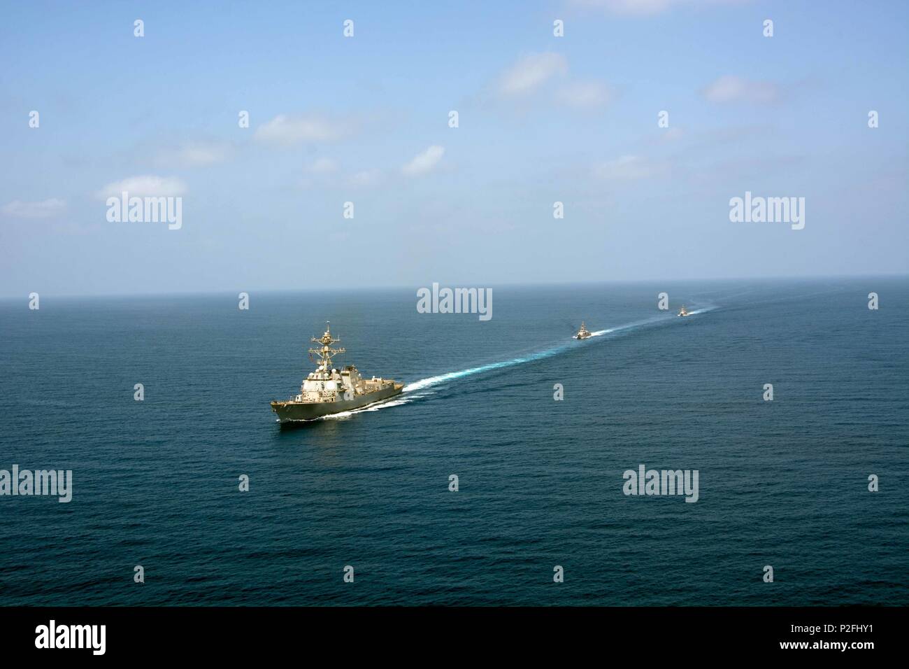 160910-N-CL027-231 ARABIAN SEA (Sept. 10, 2016) The guided-missile destroyer USS Mason (DDG 87) conducts formation exercises with the Cyclone-class patrol crafts USS Tempest (PC 2) and USS Squall (PC 7). Mason, deployed as part of the Eisenhower Carrier Strike Group, is supporting maritime security operations and theater security cooperation efforts in the U.S. 5th Fleet area of operations. (U.S. Navy photo by Mass Communications Specialist 3rd Class Janweb B. Lagazo) Stock Photo