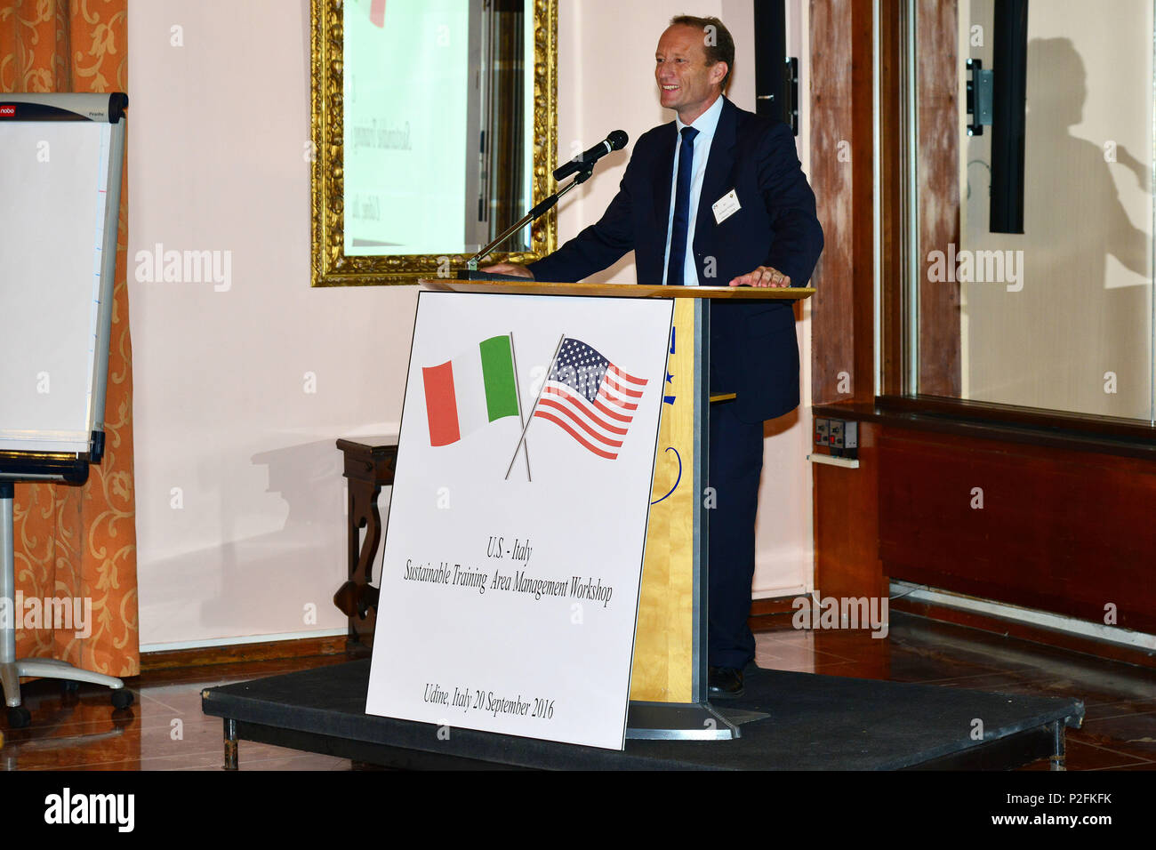 Nate Whelan , U.S. Army Europe Integrated Training Area Management (ITAM) Program Manager, Training Support Activity Europe, 7th Army Training Command, addresses members of United States Army, the Italian Army, Italian authorities and Italian Civilians from 12th Infrastructure Command, on Sustainable Training Area Management Programs, in Udine, Italy, 20 Sept. 2016. (U.S. Army photo by Visual Information Specialist Paolo Bovo/Released Stock Photo