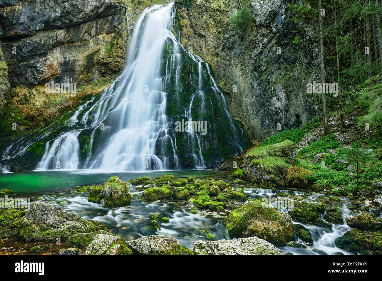 Waterfall cascading in green pond, Gollinger Wasserfall, Golling, Berchtesgaden range, Salzburg, Austria Stock Photo