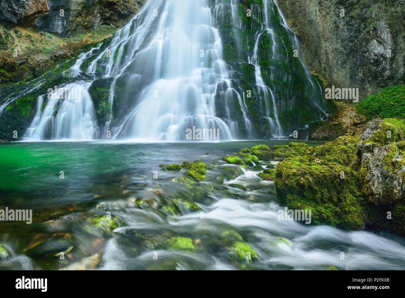 Waterfall cascading in green pond, Gollinger Wasserfall, Golling, Berchtesgaden range, Salzburg, Austria Stock Photo