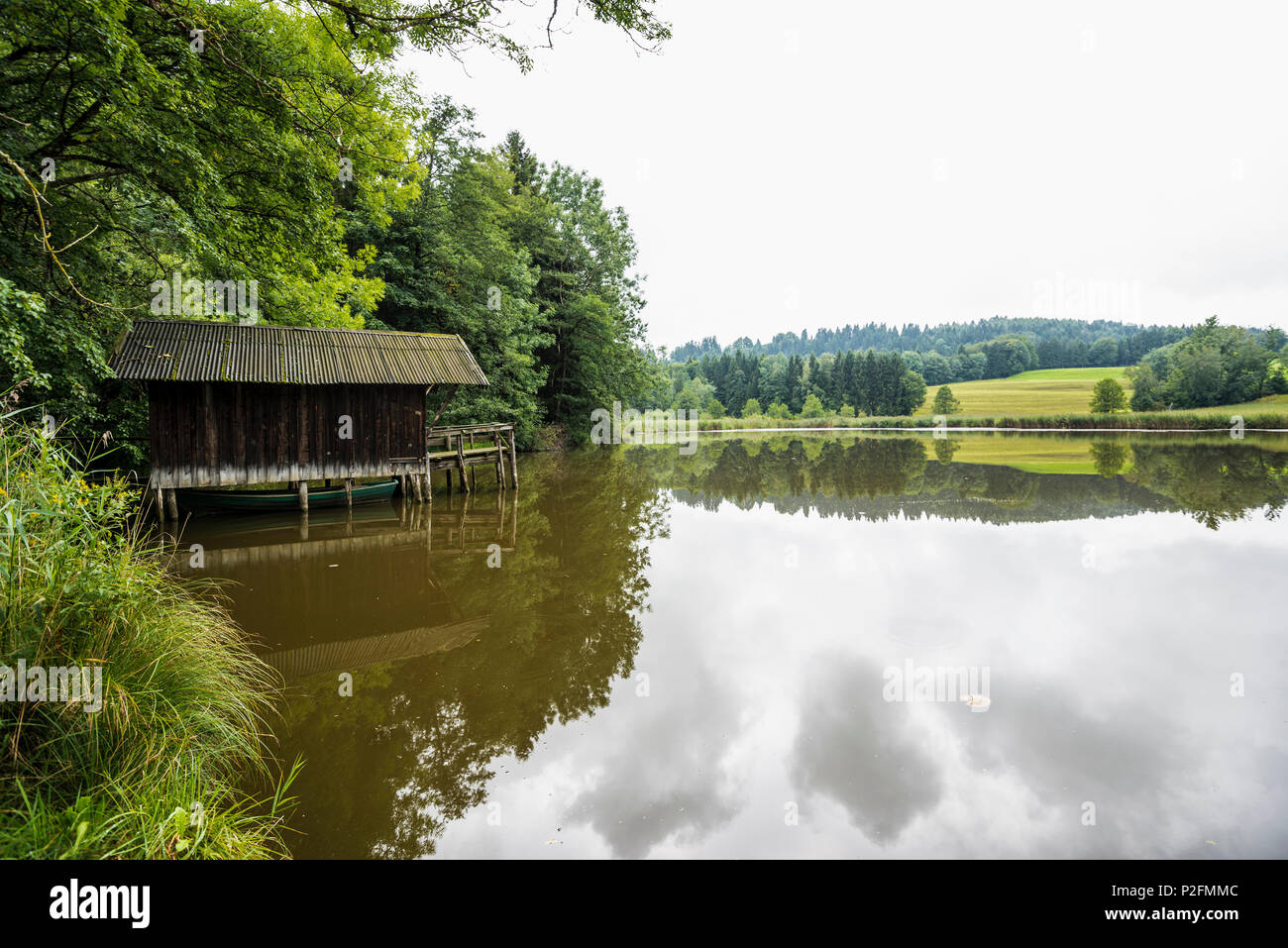 small lake with boat house near Bad Kohlgrub, Upper Bavaria, Bavaria, Germany Stock Photo