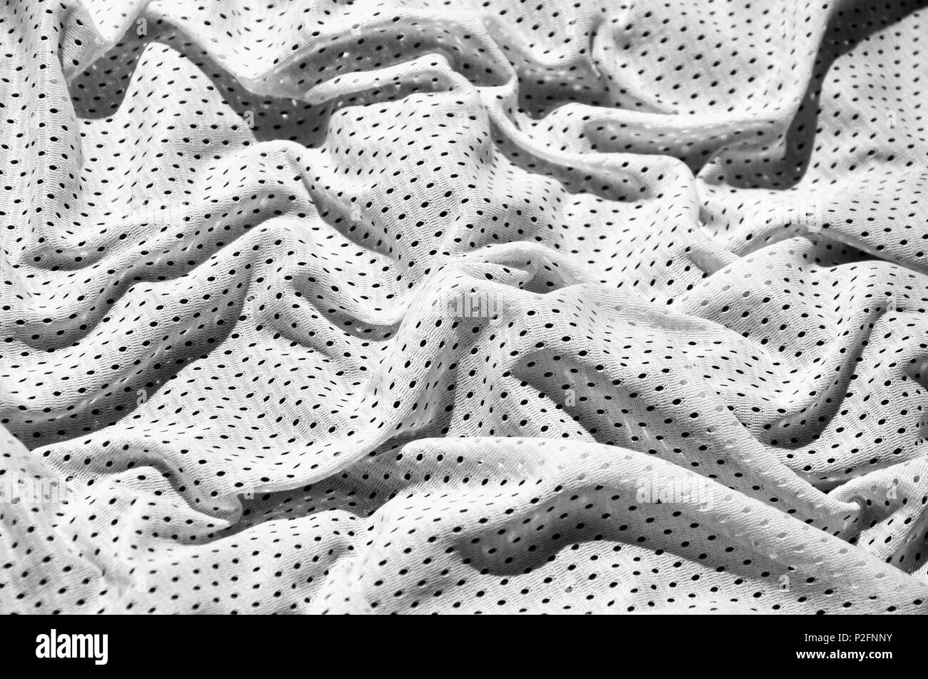 White sport clothing fabric texture background. Top view of white cloth