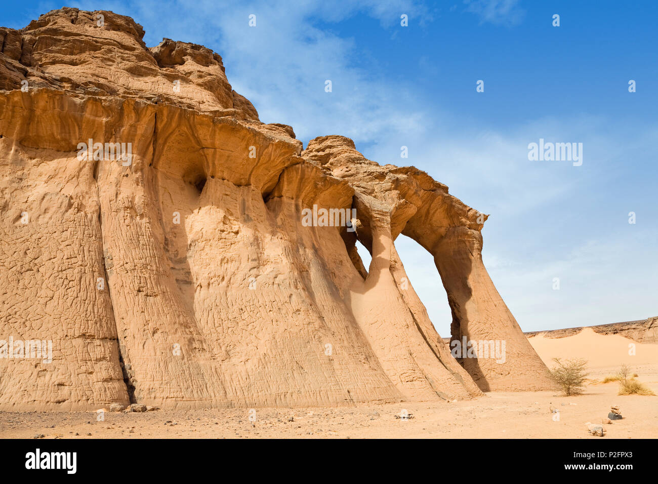 Tin Aregha Sandstone Arch in Akakus mountains, Libya, Sahara, North Africa Stock Photo