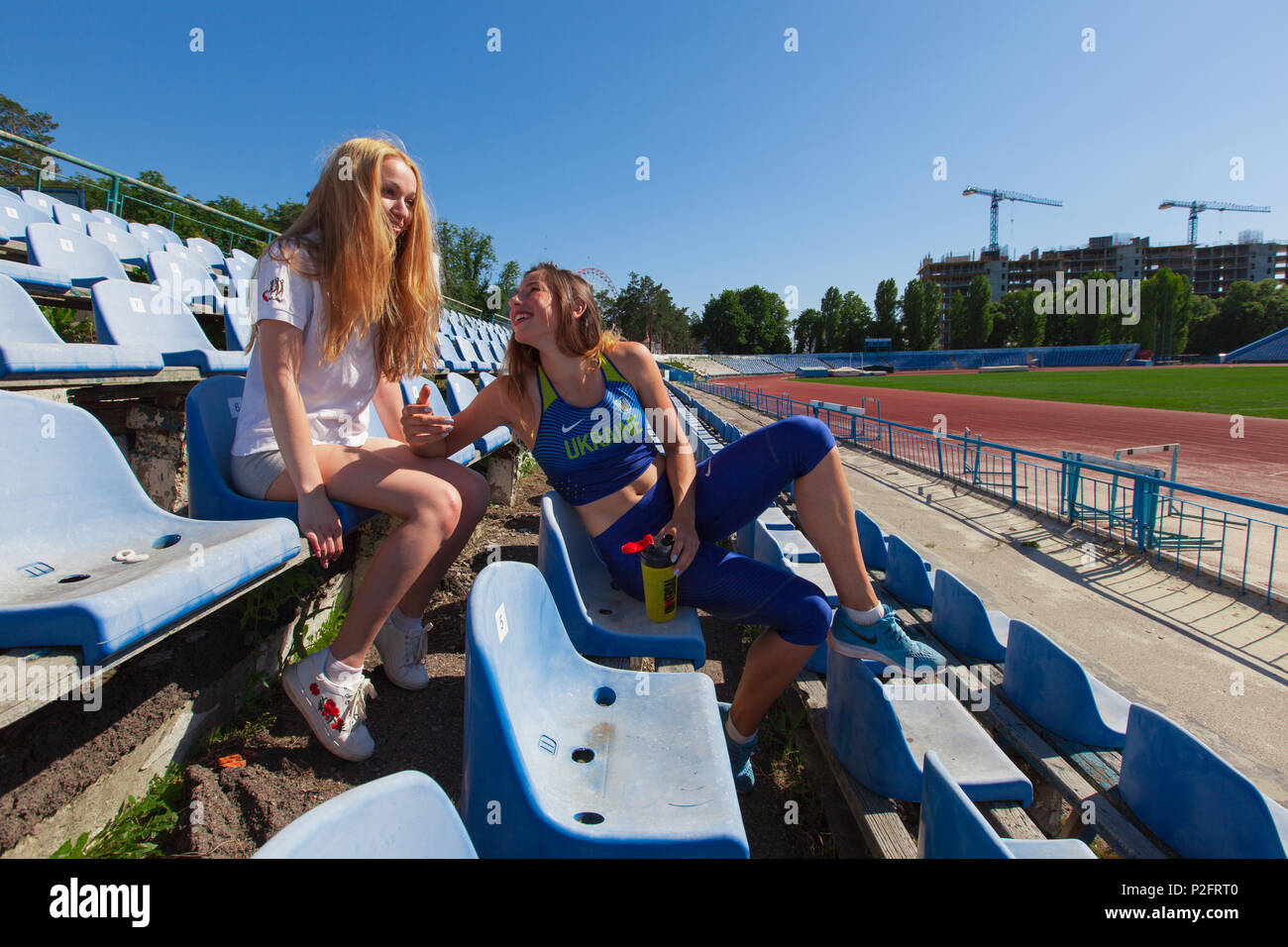 teenage girls doing sports at the stadium Stock Photo - Alamy