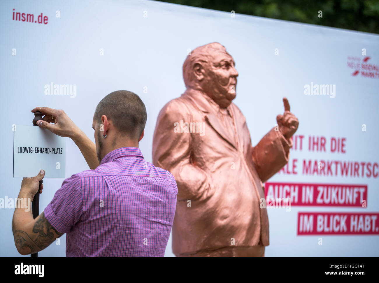 15 June 2018, Germany, Berlin: Members of the New Social Market Economy initiative ('Neue Soziale Marktwirtschaft') displaying a statue of Ludwig Erhard, the father of the 'German Economic Miracle' and of the social market economy, before Germany's Ministry of Economy. The ceremony on the 70th anniversary of economic and monetary reforms in Germany took place in the Ministry. Photo: Jens Büttner/dpa-Zentralbild/dpa Credit: dpa picture alliance/Alamy Live News Stock Photo