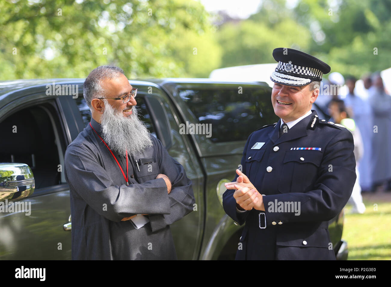 Birmingham, UK. 15th June, 2018. Over 100,000 muslims gather in Small Heath park, Birmingham, to pray on the morning of Eid, the end of the fasting month of Ramadan. West Midlands Police chief Dave Thompson attends. Peter Lopeman/Alamy Live News Stock Photo