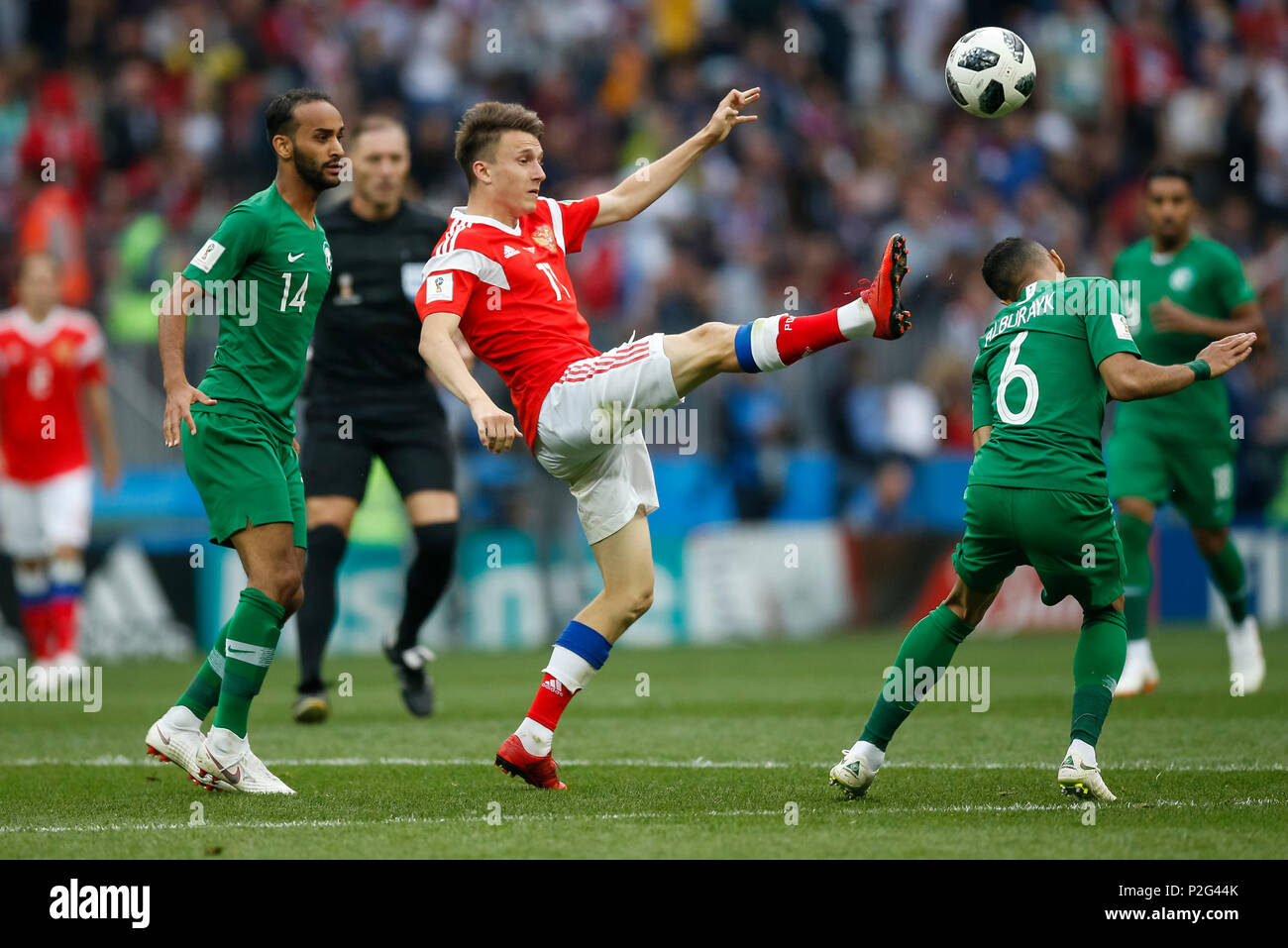 Moscow, Russia. 14th June 2018. Abdullah Otayf of Saudi Arabia, Aleksandr Golovin of Russia and Mohammed Al-Breik of Saudi Arabia during the 2018 FIFA World Cup Group A match between Russia and Saudi Arabia at Luzhniki Stadium on June 14th 2018 in Moscow, Russia. Credit: PHC Images/Alamy Live News Stock Photo