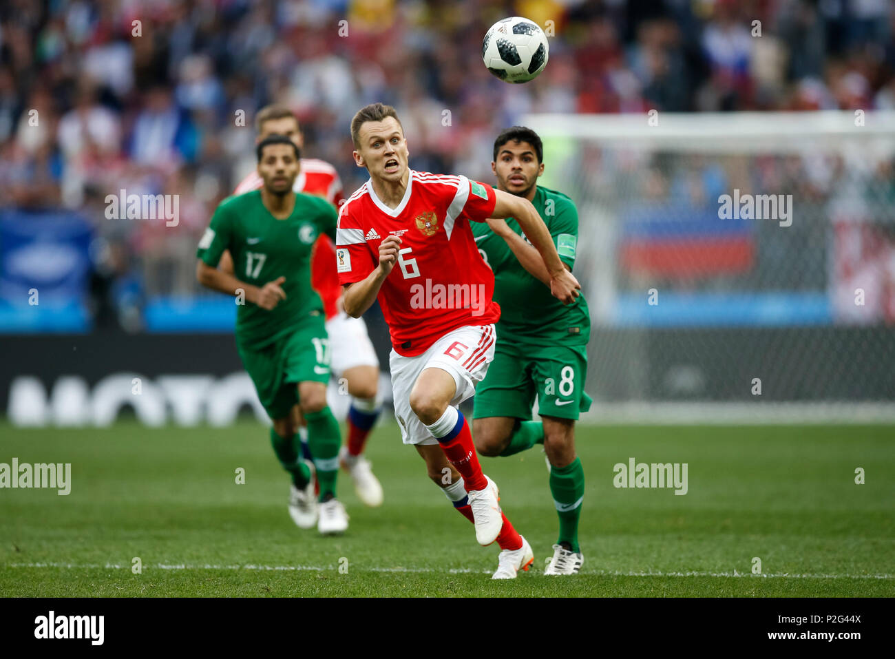 Moscow, Russia. 14th June 2018. Denis Cheryshev of Russia and Yahya Al-Shehri of Saudi Arabia during the 2018 FIFA World Cup Group A match between Russia and Saudi Arabia at Luzhniki Stadium on June 14th 2018 in Moscow, Russia. Credit: PHC Images/Alamy Live News Stock Photo