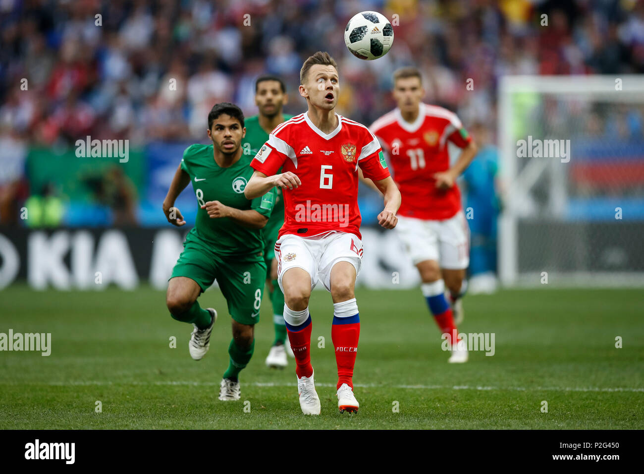 Moscow, Russia. 14th June 2018. Denis Cheryshev of Russia and Yahya Al-Shehri of Saudi Arabia during the 2018 FIFA World Cup Group A match between Russia and Saudi Arabia at Luzhniki Stadium on June 14th 2018 in Moscow, Russia. Credit: PHC Images/Alamy Live News Stock Photo