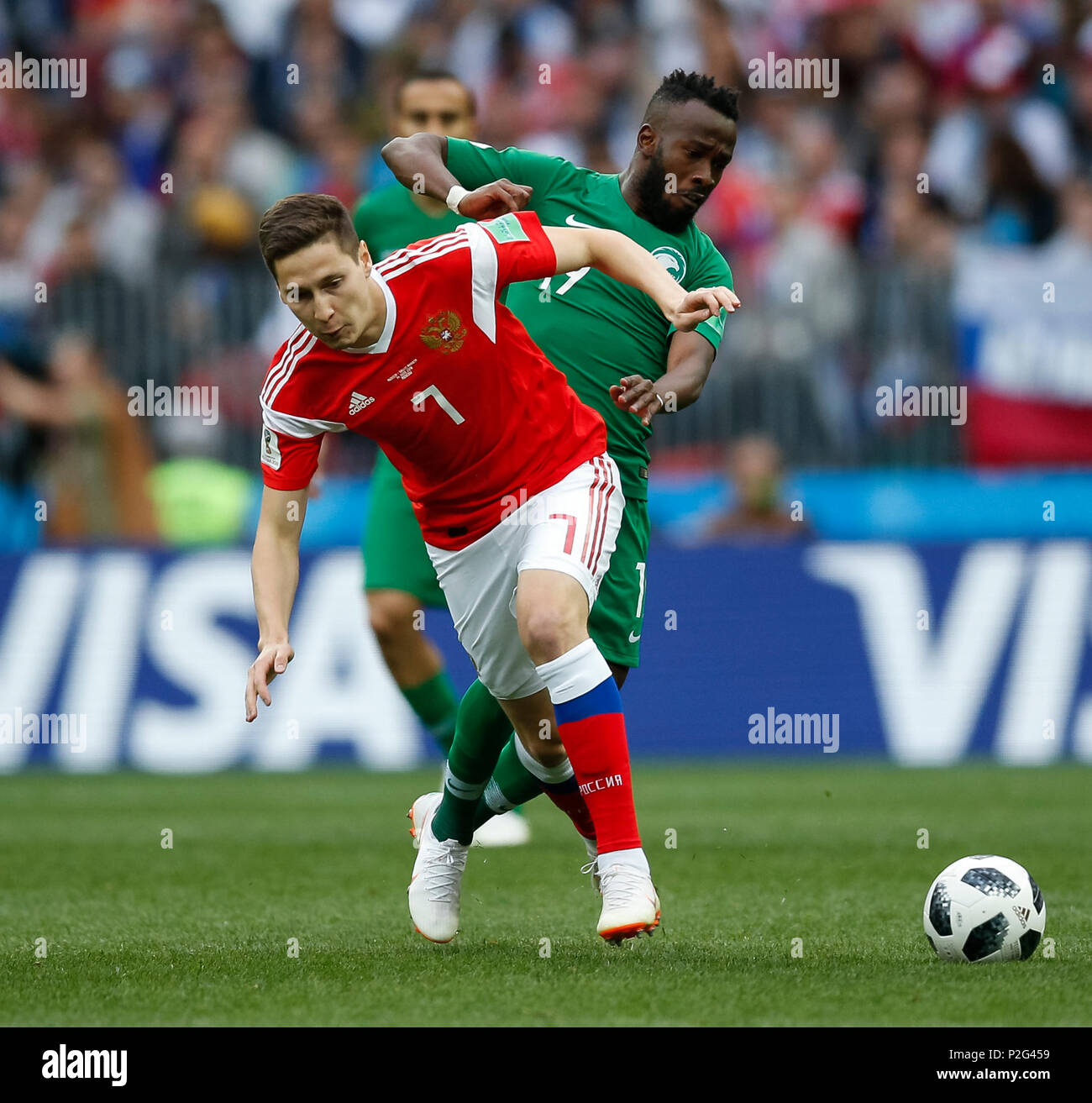 Moscow, Russia. 14th June 2018. Daler Kuzyayev of Russia and Fahad Al-Muwallad of Saudi Arabia during the 2018 FIFA World Cup Group A match between Russia and Saudi Arabia at Luzhniki Stadium on June 14th 2018 in Moscow, Russia. Credit: PHC Images/Alamy Live News Stock Photo