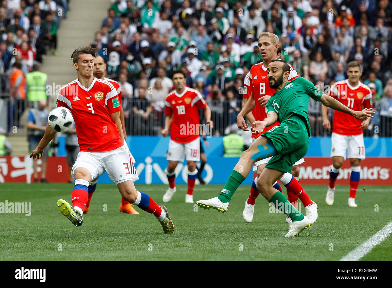 Moscow, Russia. 14th June 2018. Mohammad Al-Sahlawi of Saudi Arabia has a shot on goal during the 2018 FIFA World Cup Group A match between Russia and Saudi Arabia at Luzhniki Stadium on June 14th 2018 in Moscow, Russia. Credit: PHC Images/Alamy Live News Stock Photo