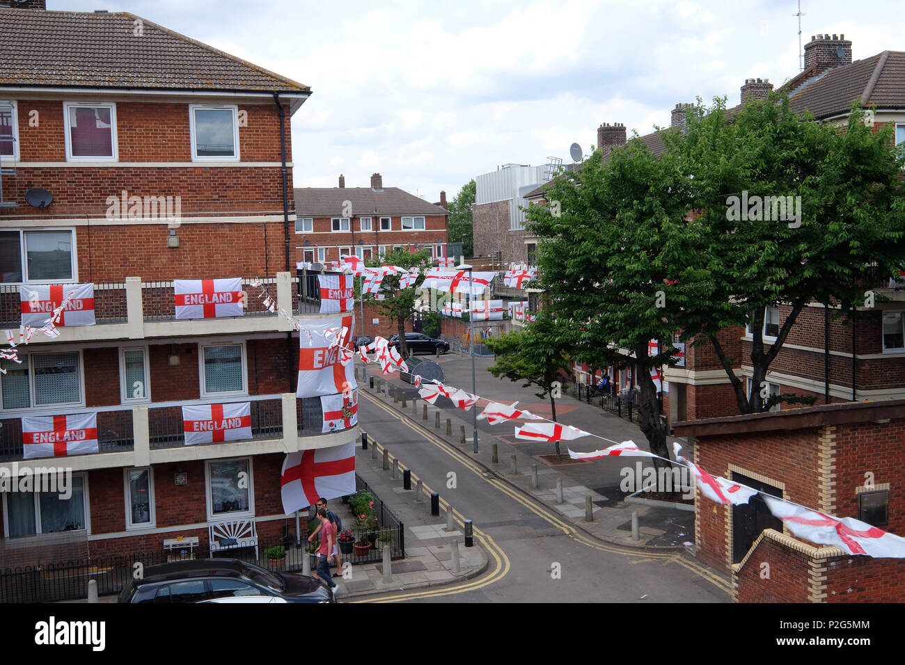 Bermondsey, UK. 15th Jun, 2018. Residents of the Kirby estate in Bermondsey fly their flags for the world cup. Predominantly England flags are interspersed with a Colombian, Polish, Portugese and French flag on this freindly estate in South London Credit: Rachel Megawhat/Alamy Live News Stock Photo