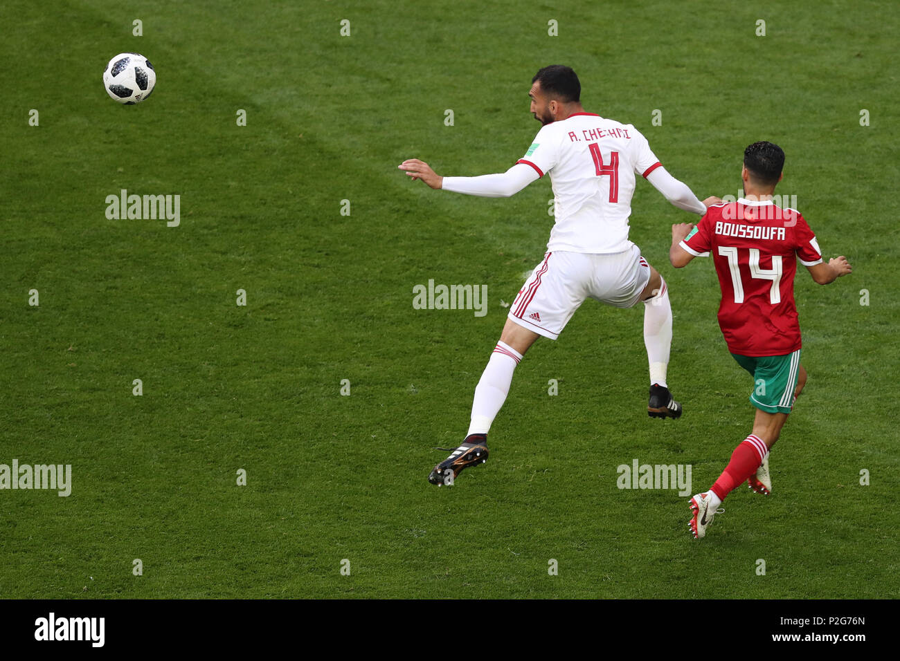 Saint Petersburg, Russia. 15th June, 2018. Morocco's Mbark Boussoufa (R) and Iran's Rouzbeh Cheshmi vie for the ball during the FIFA World Cup 2018 Group B soccer match between Iran and Morocco at the Saint Petersburg Stadium, in Saint Petersburg, Russia, 15 June 2018. Credit: Saeid Zareian/dpa/Alamy Live News Stock Photo