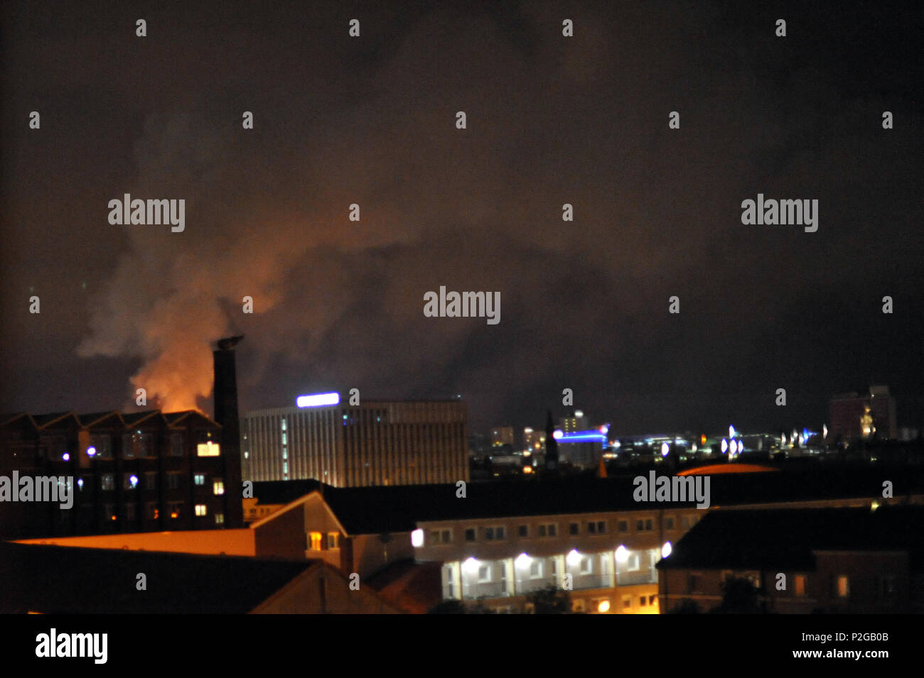 Glasgow, Scotland, UK. 16th Jun, 2018. The Glasgow School of Art is ablaze for the second time in four years. Flames can be seen across the city, these from two miles away in the Gorbals. Credit: Tony Clerkson/Alamy Live News Stock Photo