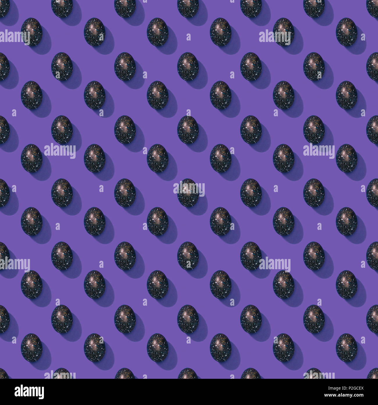set of painted easter eggs on purple Stock Photo