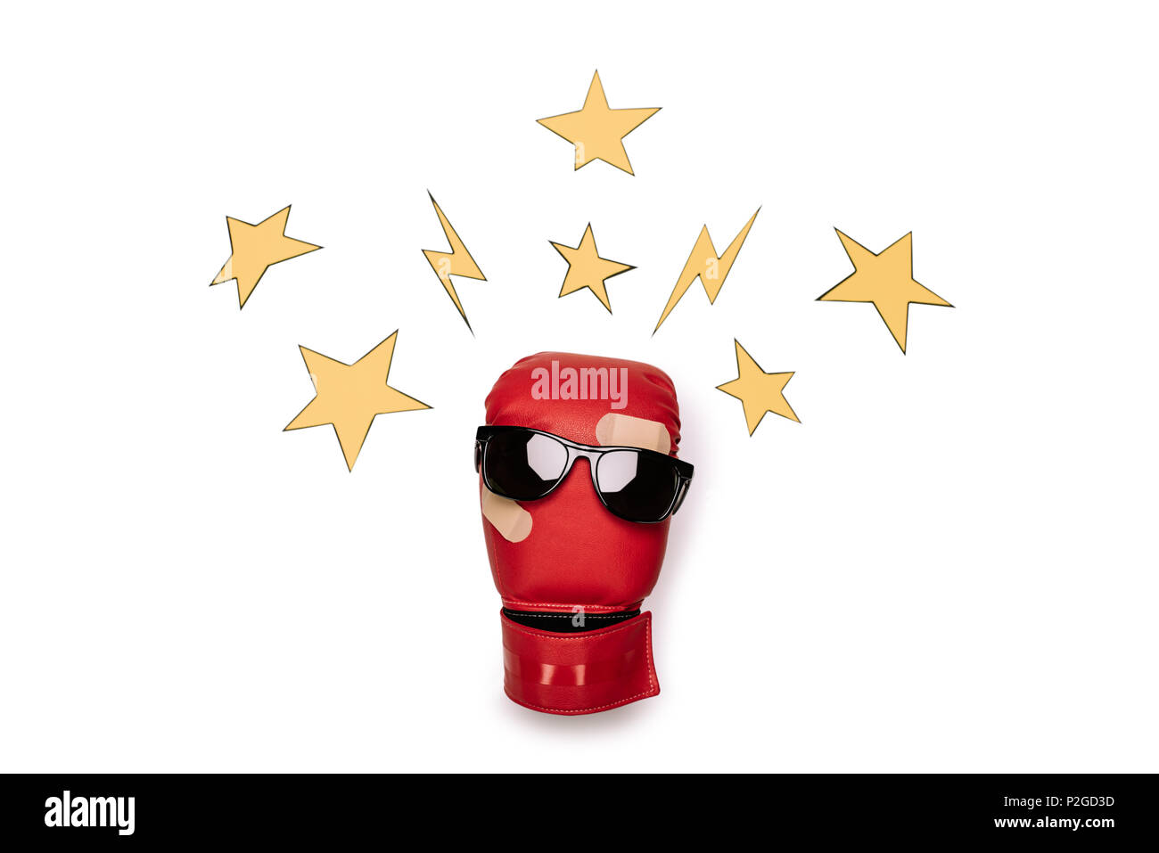 Pair of red boxing glove wearing sunglasses with stars around isolated on white Stock Photo