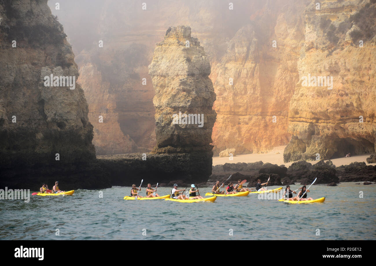Canoeists near Ponta Piedade near Lagos, Algarve, Portugal Stock Photo