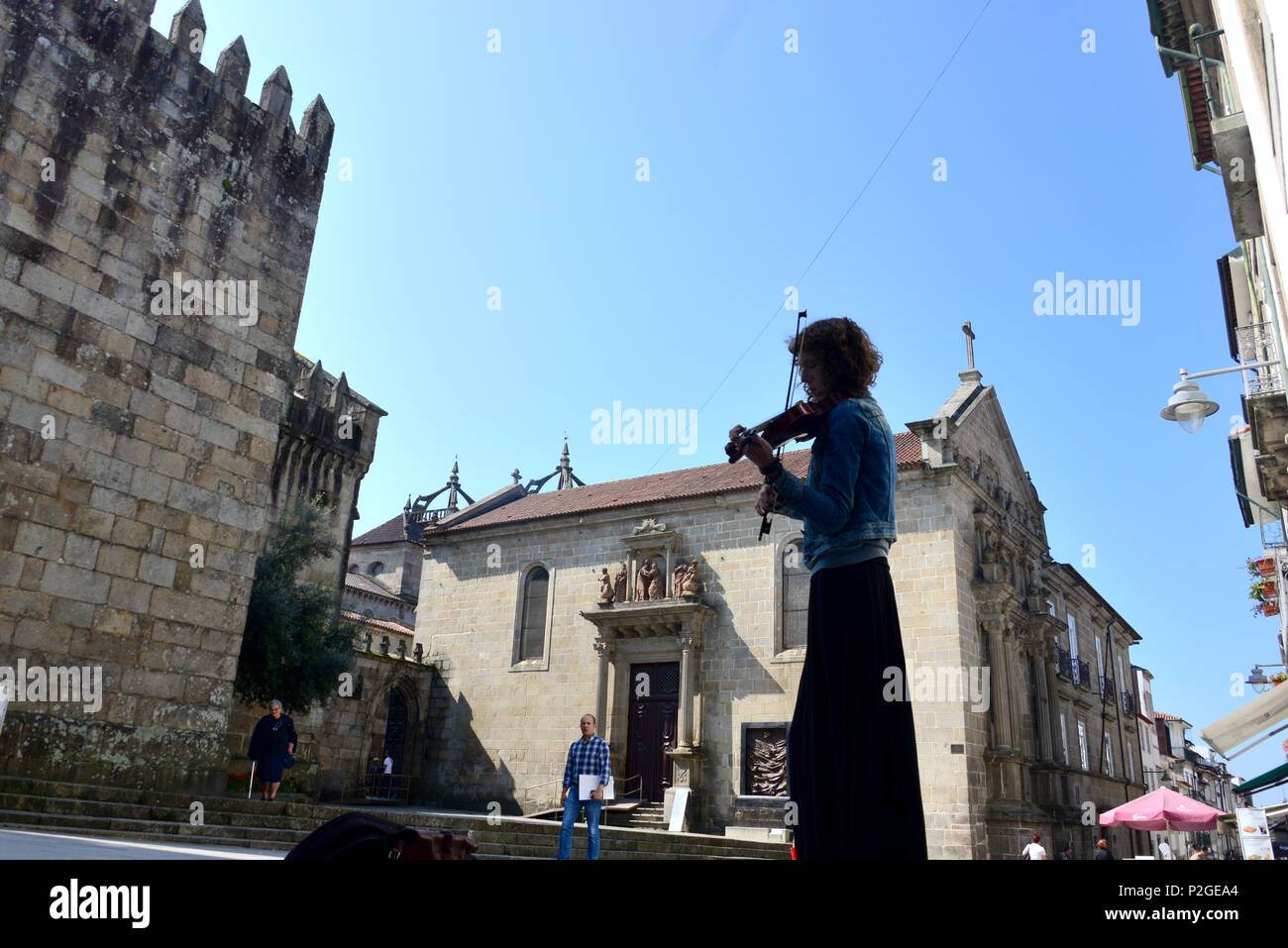 Musician at the Cathedral, Braga, Minho, Northwest-Portugal, Portuga Stock Photo