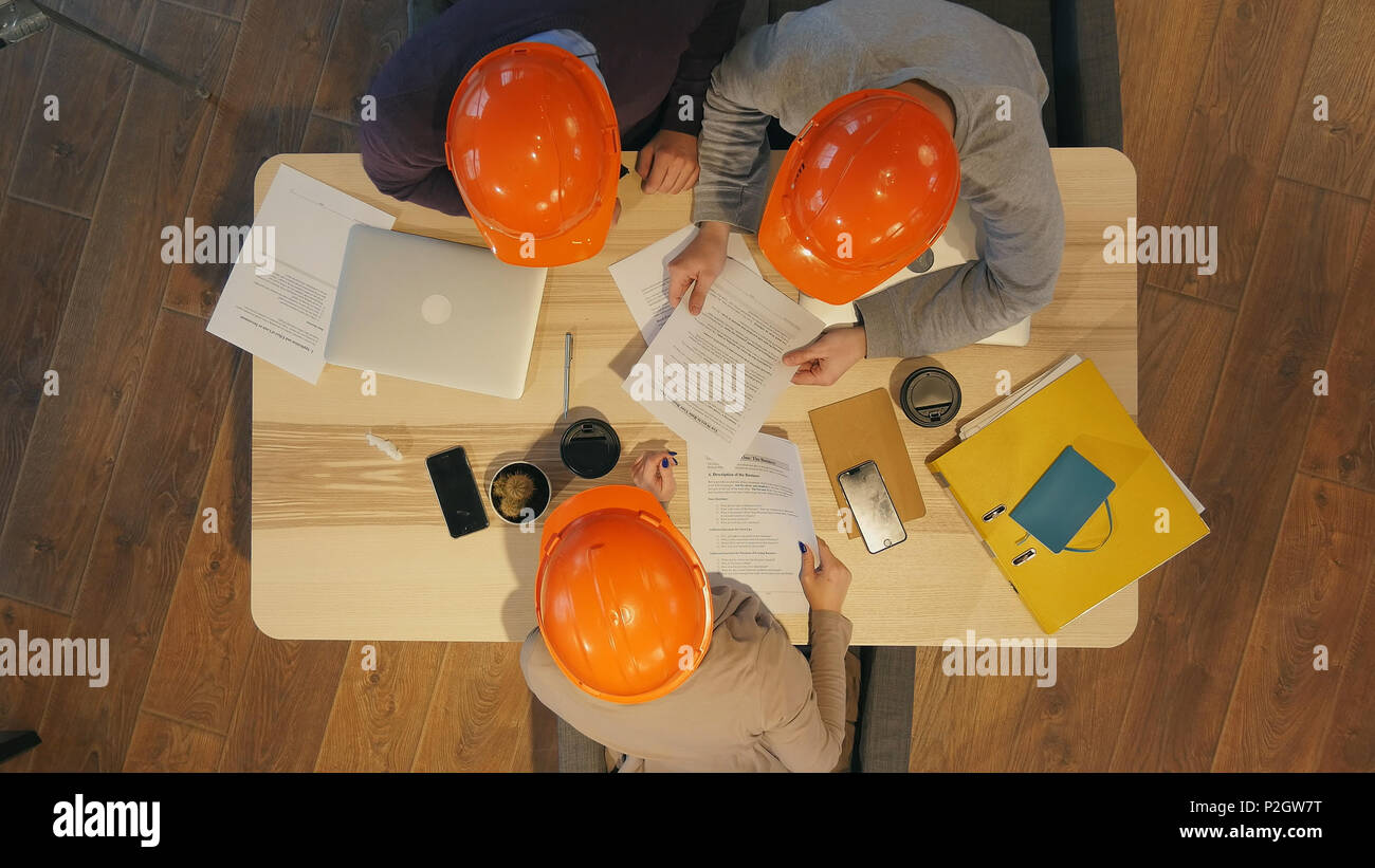 Architect engineer meeting people brainstorming Stock Photo - Alamy