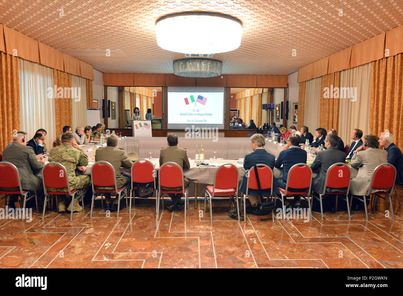 Dott.ssa Mariagrazia Santoro, from Region Friuli Venezia Giulia, addresses members of United States Army, the Italian Army, Italian authorities and Italian Civilians from 12th Infrastructure Command on Sustainable Training Area Management Programs, in Udine, Italy, 20 Sept. 2016. (U.S. Army photo by Visual Information Specialist Paolo Bovo/Released) Stock Photo