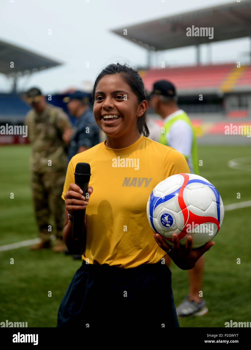 PANAMA CITY, Panama (Sept. 20, 2016) - Logistics Specialist Seaman Raina Ramirez, a Sailor assigned to USNS Spearhead (T-EPF-1), thanks the UNITAS partner nations participating in a day of sports at the Estadio Maracaná de Panamá soccer stadium. UNITAS is an annual multi-national exercise that focuses on strengthening our existing regional partnerships and encourages establishing new relationships through the exchange of maritime mission-focused knowledge and expertise throughout the exercise. (U.S. Navy Photo by Mass Communication Specialist 1st Class Jacob Sippel/RELEASED) Stock Photo