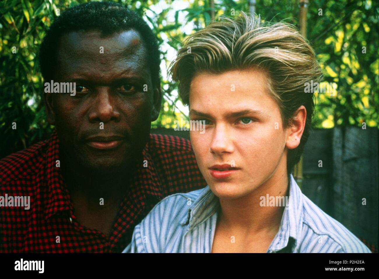 Description: Jul 01, 1988; Hollywood, CA, USA; Actors SIDNEY POITIER as Roy Parmenter and RIVER PHOENIX as Jeff Grant star in the drama thriller 'Little Nikita' directed by Richard Benjamin..  Original Film Title: LITTLE NIKITA.  English Title: LITTLE NIKITA.  Film Director: RICHARD BENJAMIN.  Year: 1988.  Stars: SIDNEY POITIER; RIVER PHOENIX. Stock Photo